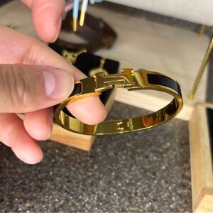 Hermes bracelets black and gold